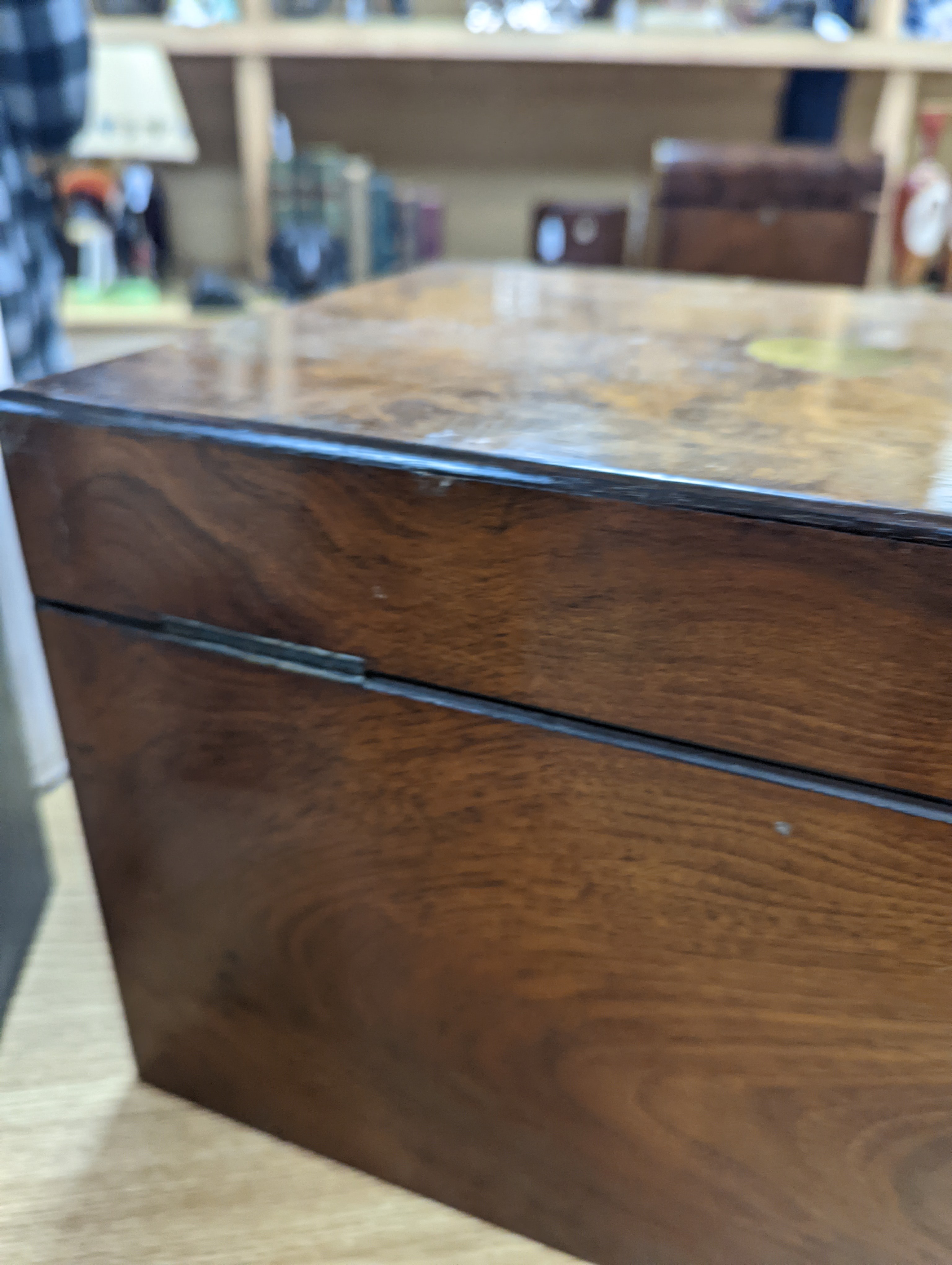 A Victorian walnut sewing casket, 34cm, containing sewing related accessories